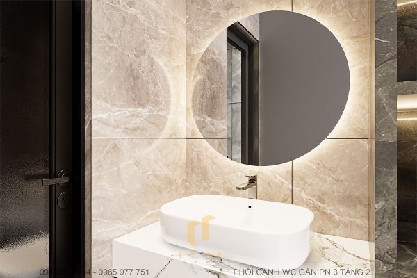 Khu vực lavabo được bố trí gương tròn mang lại tính thẩm mỹ cao