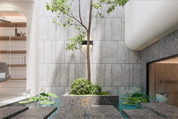 Không gian giếng trời cạnh phòng khách mang vẻ đẹp xanh ngát, thơ mộng