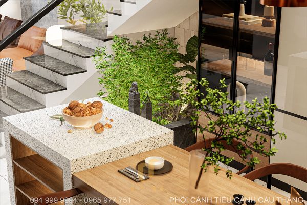 Tiểu cảnh ở cầu thang giúp tô điểm sắc xanh cho căn nhà