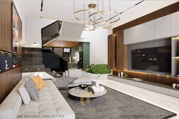 Khu vực tiếp khách được bố trí sofa chữ L lớn và tivi sát tường tạo sự thông thoáng cho không gian