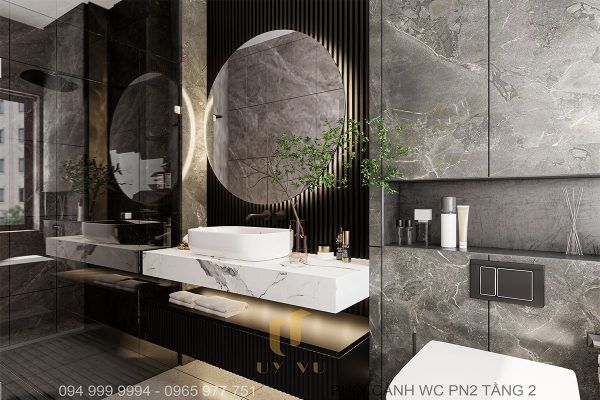 Khu vực lavabo được lát bằng đá cẩm thạch trắng tạo điểm nhấn cho không gian