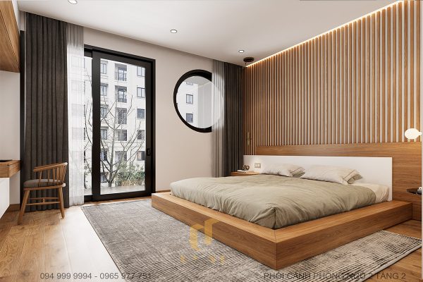Phòng ngủ master được bố trí cửa kính lớn hướng ra ban công xanh mát
