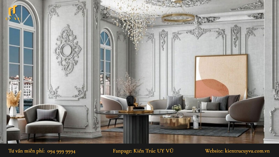 Thiết kế nội thất tân cổ điển: Khái niệm, đặc trưng & mẫu thiết kế đẹp Thiết kế nội thất tân cổ điển trong phòng khách tập trung vào các bề mặt tường, trần nhà.