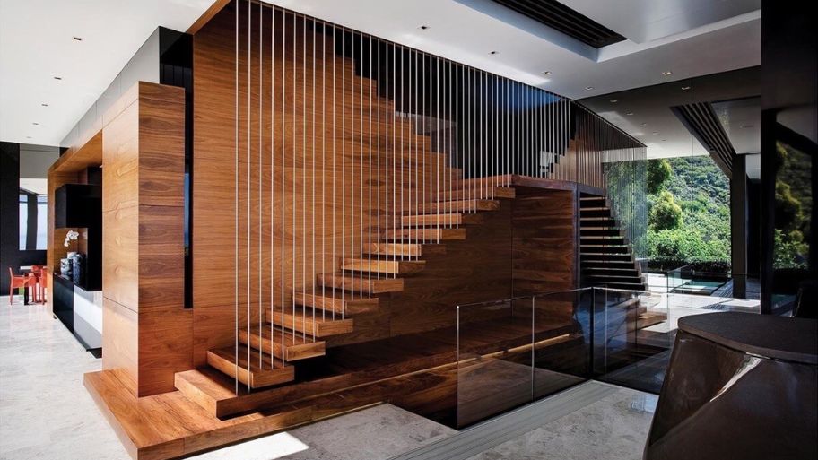 Khám phá xu hướng thiết kế nhà có cầu thang dọc độc đáo hiện nay Mẫu nhà ống 3 tầng có cầu thang dọc