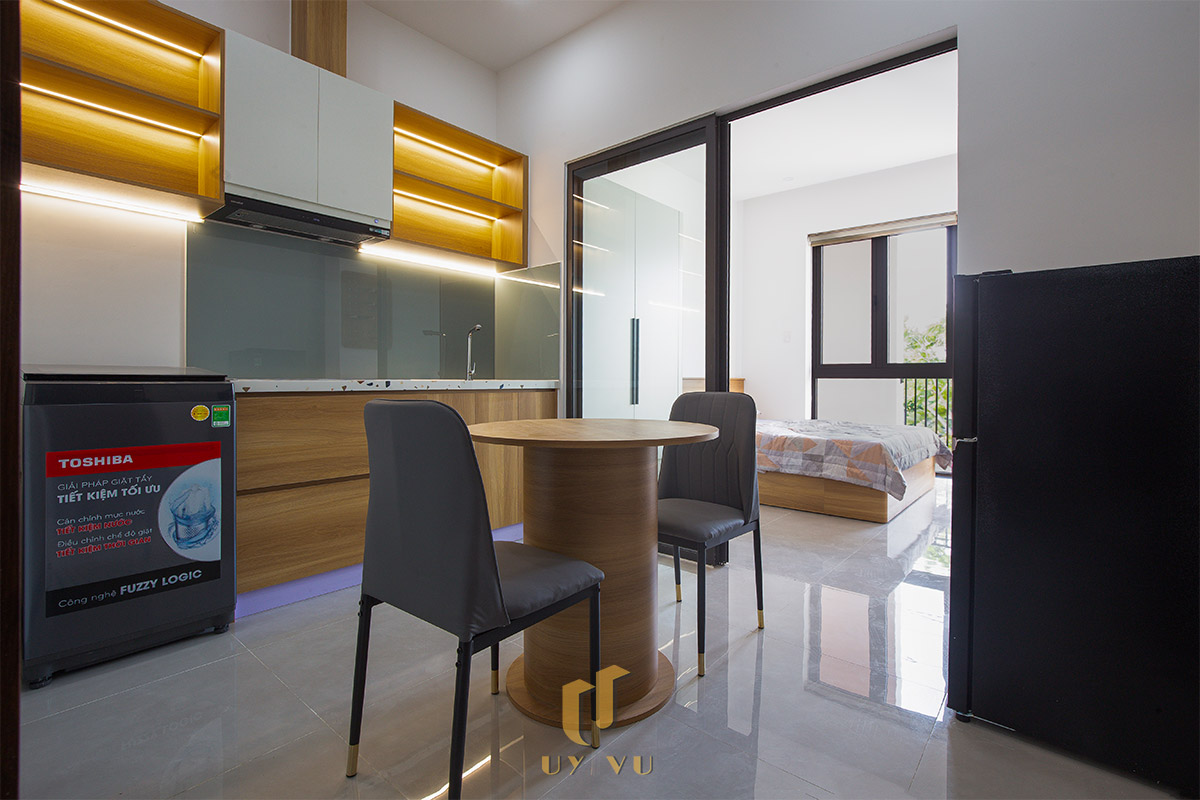 Mỡ Apartment – Căn Hộ Cho Thuê Đà Nẵng Hiện Đại, Tối Ưu 2-Không gian bếp và bàn ăn căn hộ Mỡ Apartment gọn gàng, ấm cúng