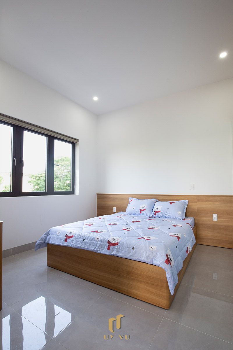 Mỡ Apartment – Căn Hộ Cho Thuê Đà Nẵng Hiện Đại, Tối Ưu 31 - Không gian phòng ngủ rộng rãi với giường đôi và cửa sổ lớn thoáng mát