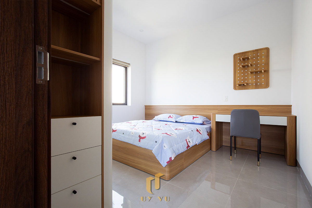 Mỡ Apartment – Căn Hộ Cho Thuê Đà Nẵng Hiện Đại, Tối Ưu 35 - Phòng ngủ căn hộ cho thuê Đà Nẵng nội thất gỗ hiện đại, bố trí gọn gàng