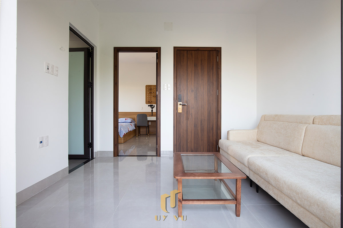 Mỡ Apartment – Căn Hộ Cho Thuê Đà Nẵng Hiện Đại, Tối Ưu 41 - Không gian phòng khách kết nối phòng ngủ trong căn hộ cho thuê Đà Nẵng