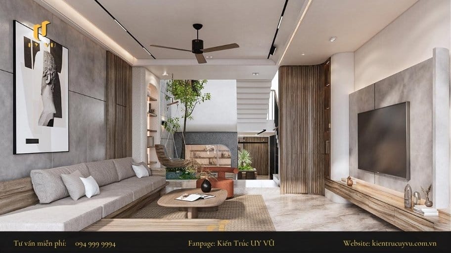 Tổng hợp các mẫu thiết kế phòng khách nhà ống có cầu thang hài hòa giữa công năng và thẩm mỹ Bố trí thêm các hệ tủ hoặc điểm nhấn để tách biệt không gian phòng khách và cầu thang