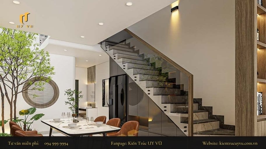 Giải pháp thiết kế nhà có chiều sâu hẹp đẹp và tiện nghi Tăng thêm khoảng lưu trữ những vật dụng tại chân cầu thang để tối ưu diện tích