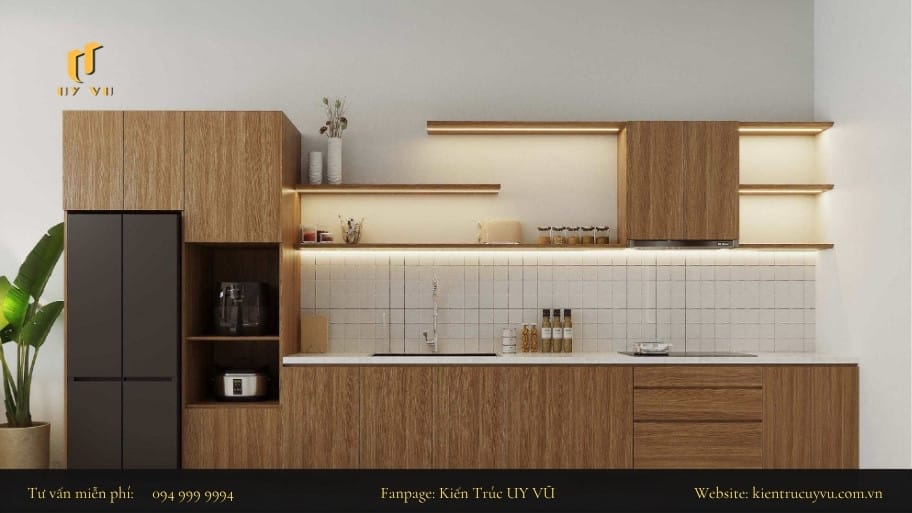 Sử dụng gam màu đồng nhất cùng với hệ thống chiếu sáng để tạo nên không gian hài hòa và nổi bật gian bếp