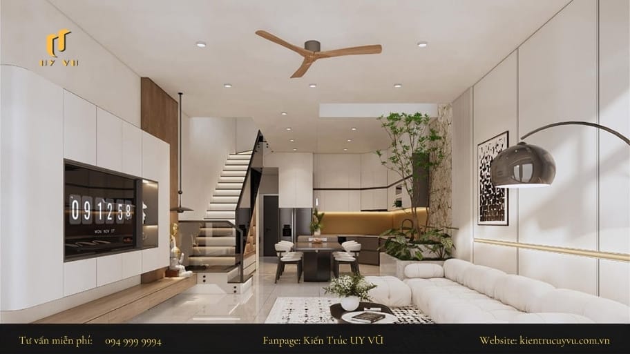 Tổng hợp các mẫu thiết kế phòng khách nhà ống có cầu thang hài hòa giữa công năng và thẩm mỹ Cầu thang làm nổi bật không gian phòng khách và khu vực bếp