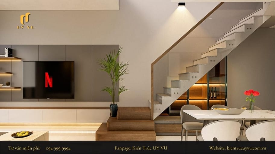 Tổng hợp các mẫu thiết kế phòng khách nhà ống có cầu thang hài hòa giữa công năng và thẩm mỹ Đảm bảo sự gọn gàng và có các khu vực lưu trữ cần thiết dưới cầu thang